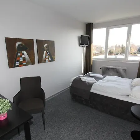 호텔 Banegaardshotellet Vojens